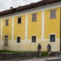 The Provost's House was originally built in 1493 next to the capital church as soon as the collegiate chapter was founded. Until 1623, it was rebuilt several times. Its simple yet massive structure is ornamented by an inscription in Latin and three coats of arms on a stone plate situated above the portal.